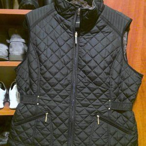 Black quilted faux fur vest